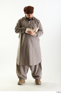 Luis Donovan Afgan Reading Book Standing reading standing whole body…